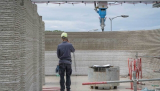 Un petit immeuble  imprimé sur site en 3D