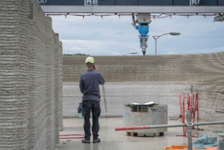 Un petit immeuble  imprimé sur site en 3D